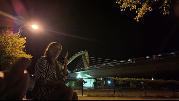 An exhibitionist came to a whore at the spot. She doesn't know what to do with him.